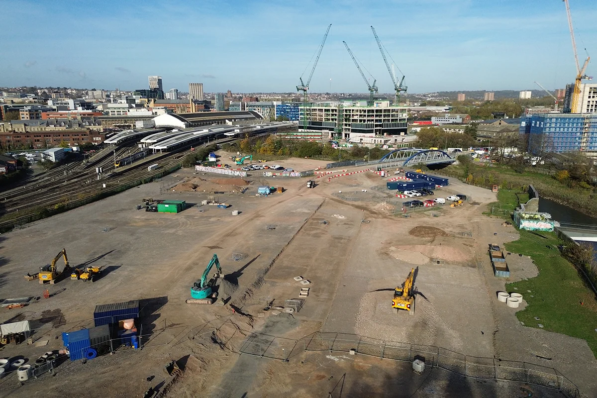 - Aerial image of works to prepare Temple Island. There are diggers and machinery.