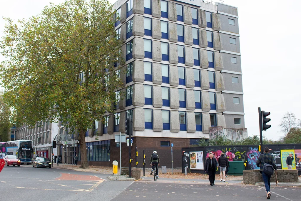 - Photo of the Holiday Inn at Temple Gate. It is a seven storey building clad in concrete.